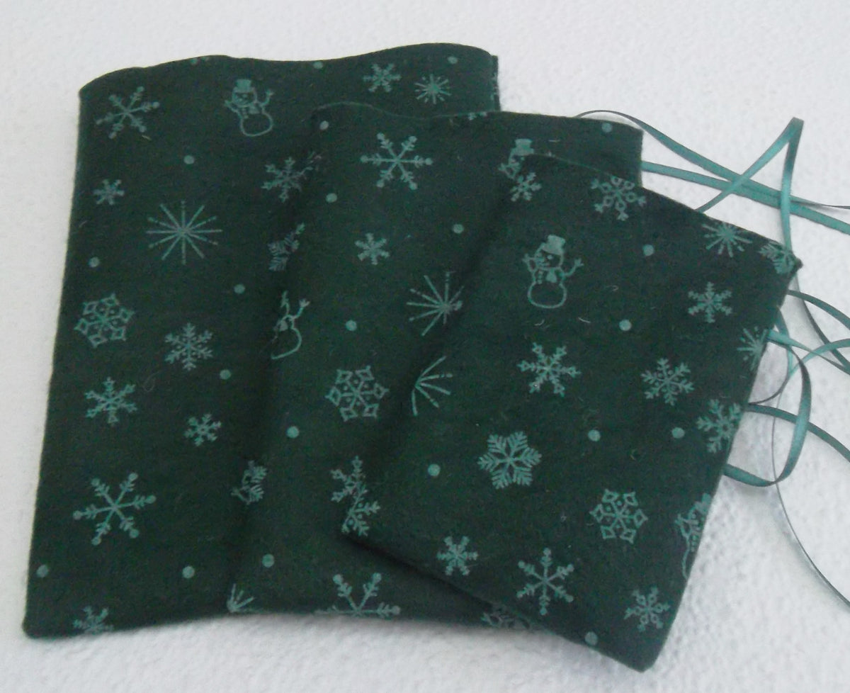 Filz-Säckchen grün mit Weihnachtsmotiv verschiedene Größen Handarbeit