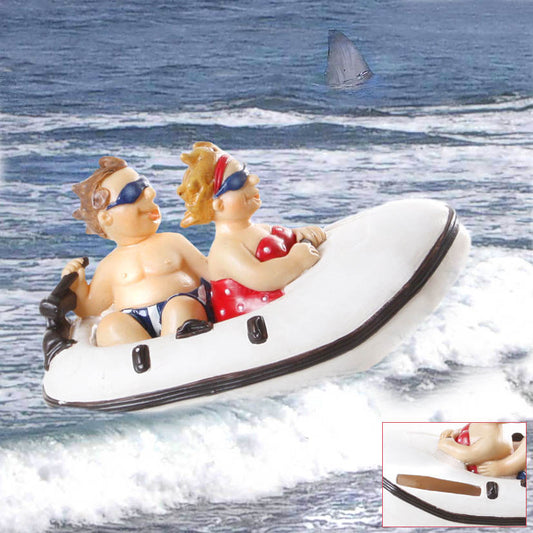 Spardose Urlaub Strandurlauber im Schlauchboot